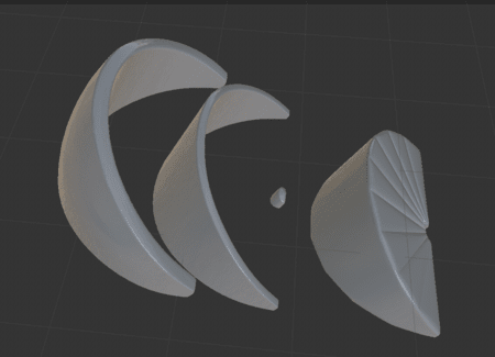 <b>Orange curved and flat shapes</b><br>In this Cinema 4D model, I display different shapes from my model, including curved and flat parts. I focus on the design details, showing how each piece fits together to create the whole object, which helps me visualize the final look.