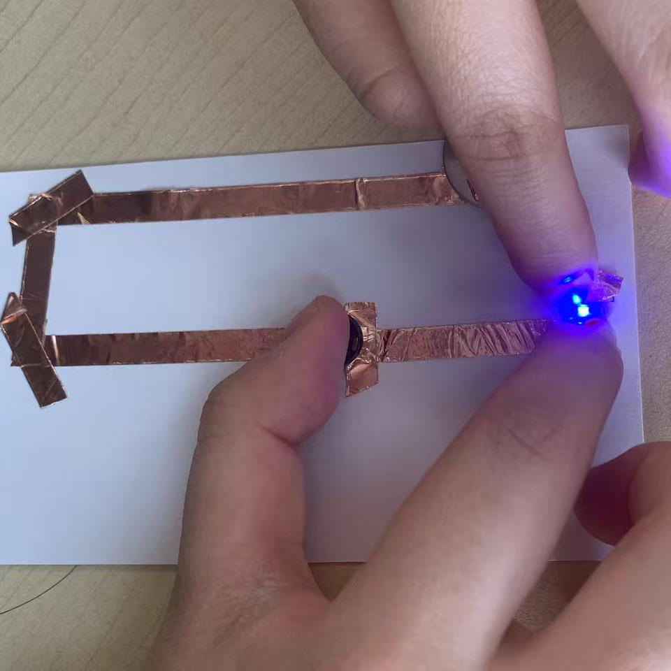 I created a triangular circuit design with a battery and LED. The shape is unique and offers a different connection approach.
