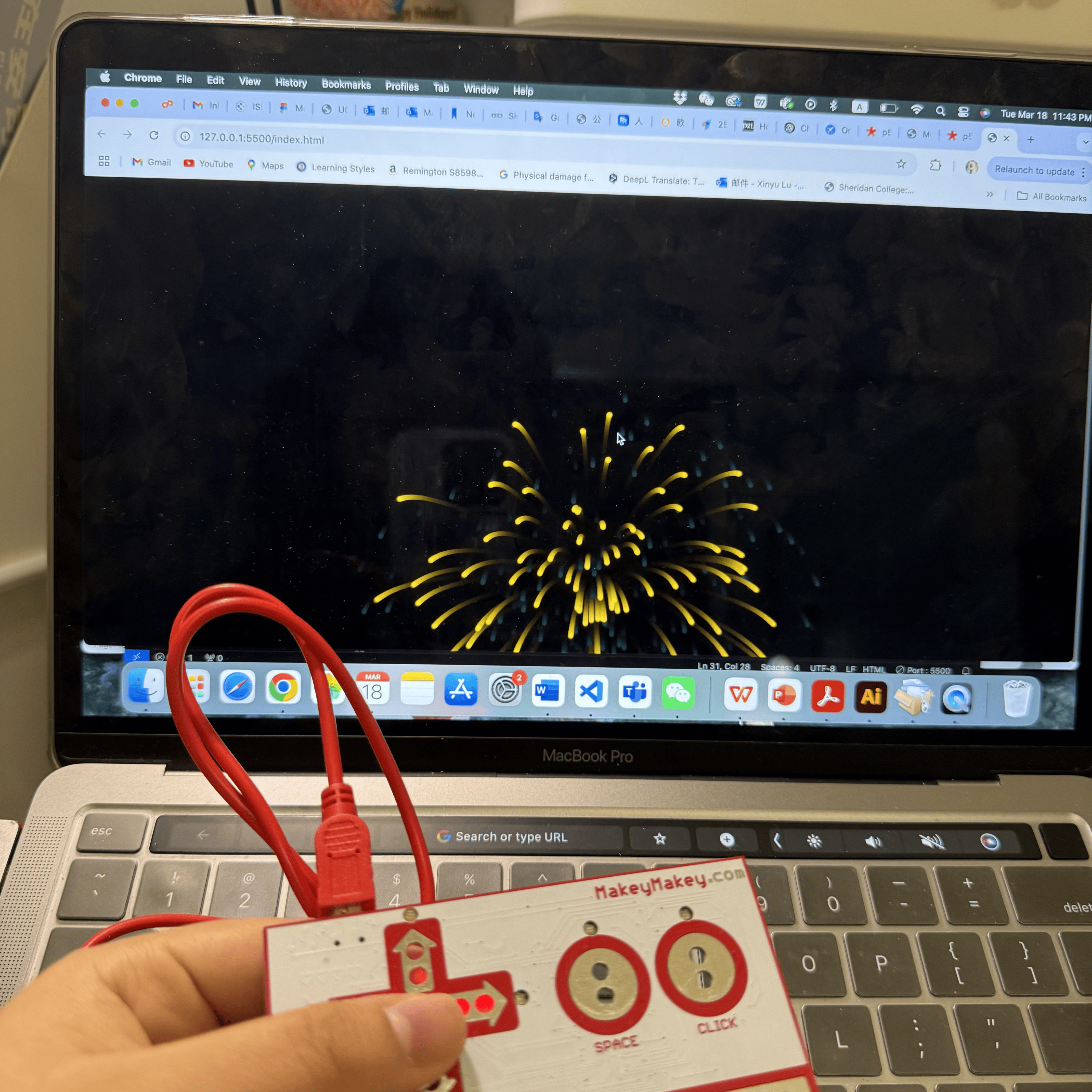 In this photo, I'm using a Makey Makey device connected to my laptop to interact with a fireworks simulation displayed on the screen. By pressing different keys, I can launch fireworks in various colors, adding excitement and interaction to the visual display.