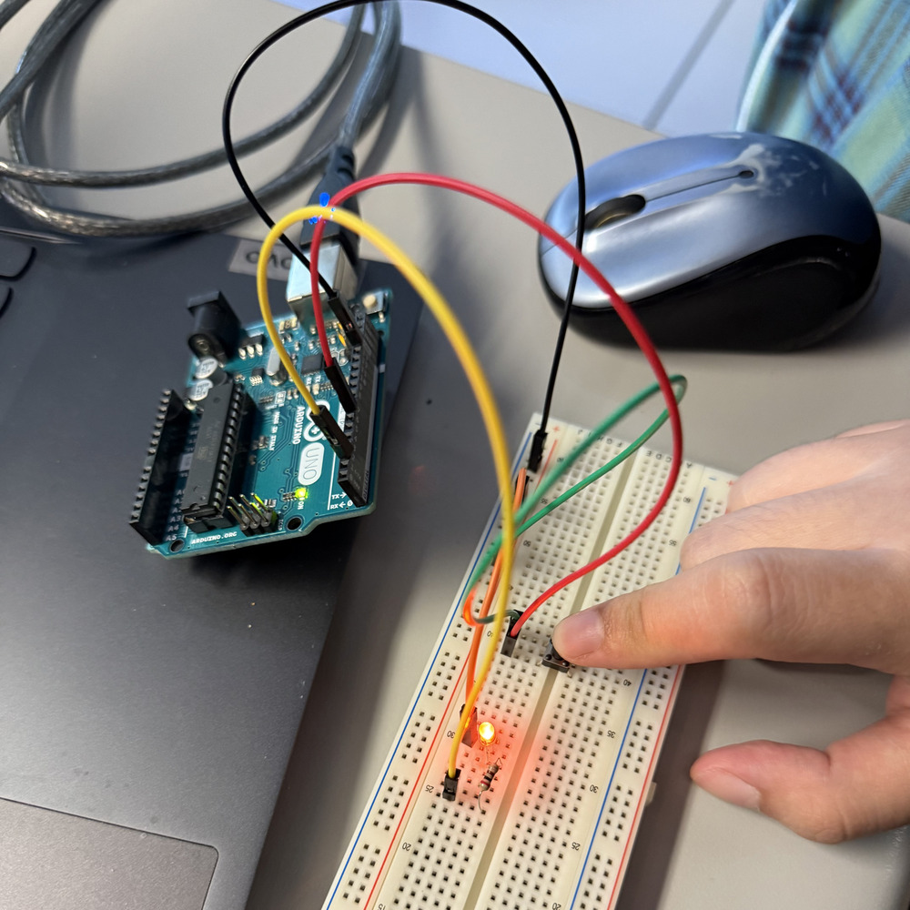 <b>Button-Controlled LED Test</b><br>I added a push button to the breadboard and tested it with the red LED. When I press the button, the LED turns on, which shows the input is working. This helps me learn how to use digital input and output in my Arduino project.