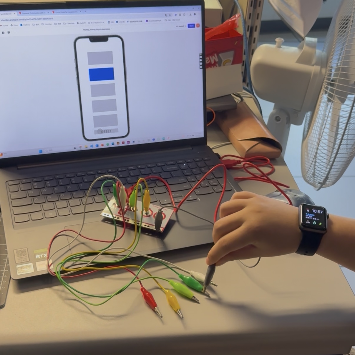 <b>Testing My Makey Makey Connection</b><br>I connected my Makey Makey board to my laptop using different colored wires. I tested each wire by touching the clips and watching the response on the screen. I used this setup to control a digital interface on the computer.<br><br>https://www.youtube.com/shorts/XfDtj-X0XfU