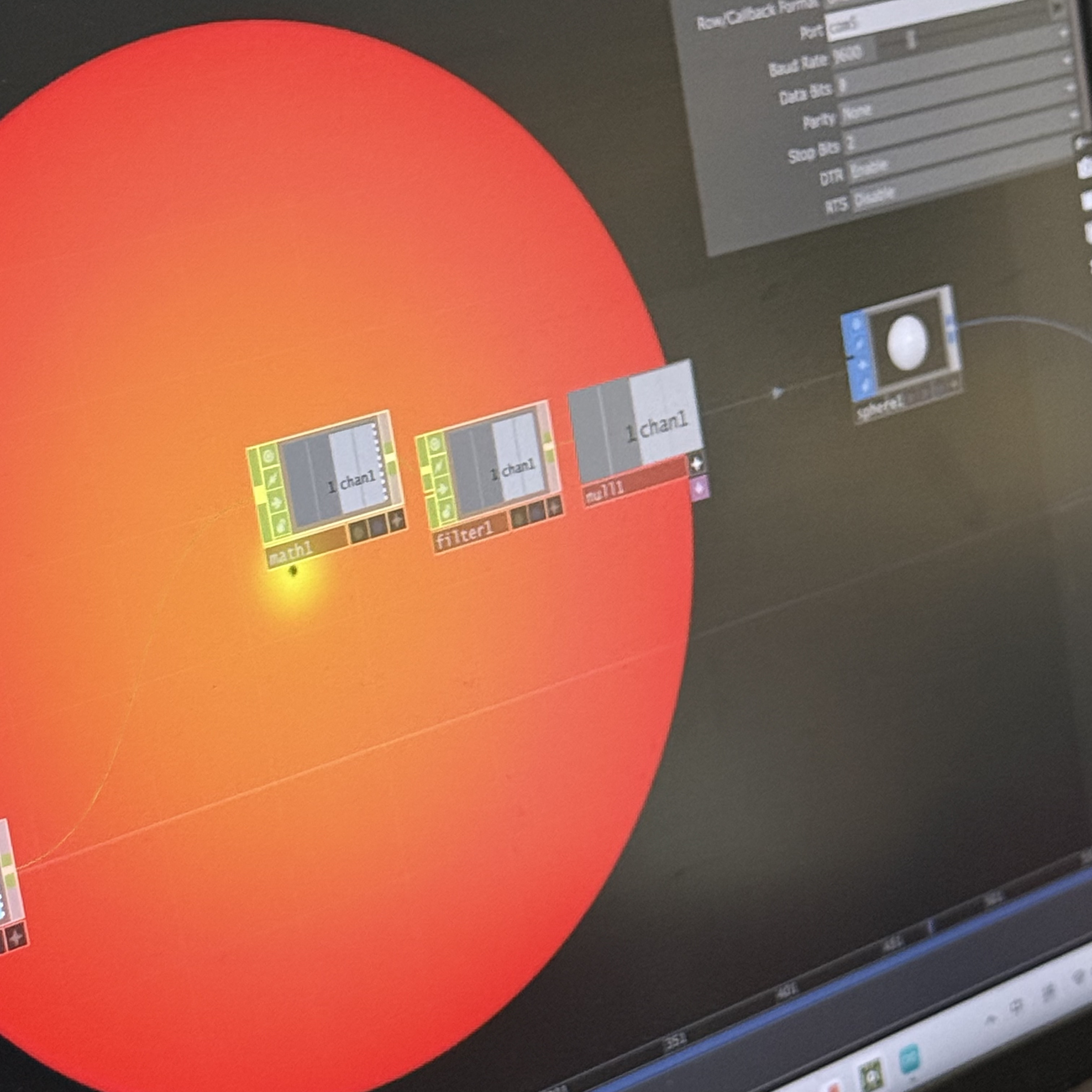 <b>Testing the Data Flow</b><br>I built a small network using Math, Filter, and Null nodes to clean and smooth the data. The large red circle on the screen reacted to the input values. It showed that my sensor connection and logic were working properly.