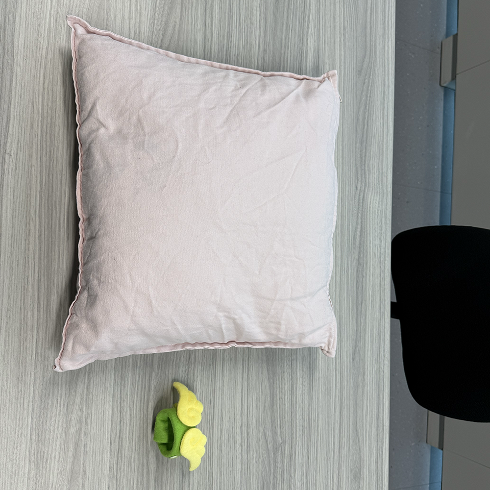 <b>Preparing Materials</b><br>We prepared the soft cushion and the wrist band pieces for our prototype. These materials will hold the force sensor inside the cushion and the pulse sensor inside the wrist band. At this stage, we focused on arranging the parts before adding any electronics.